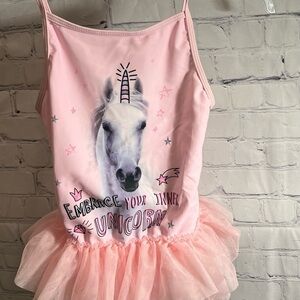 size 7 and a new with tags unicorn swimsuit